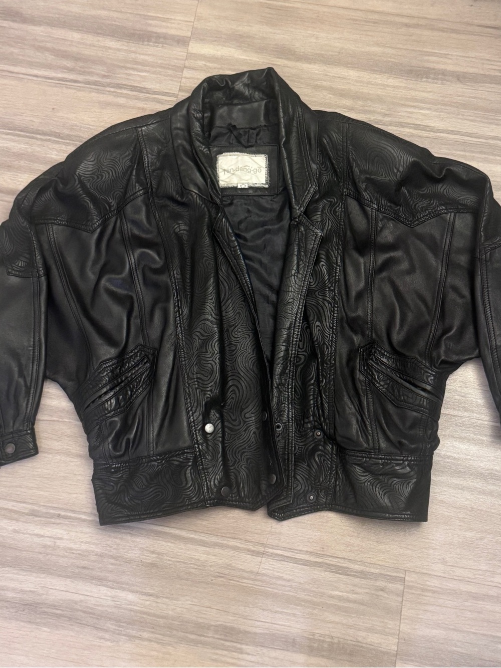 Black Women's Genuine Leather Bomber Jacket with Subtle Embossed Detail
